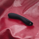 Ember vibrating wand in profile, curved head for deep vaginal stimulation